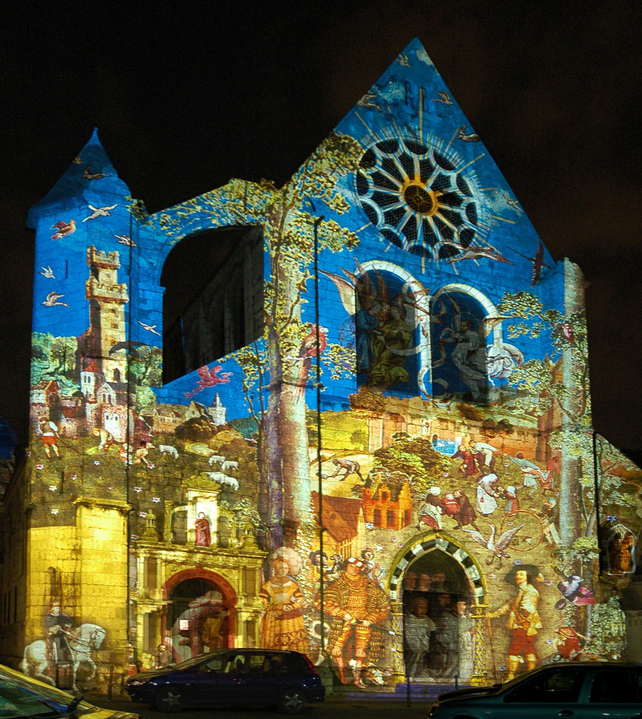 Chartres lit up at Saint aignan church with facade totally covered in different coloured lights