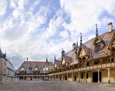 hospice de beaune old buildings with coloured tiles