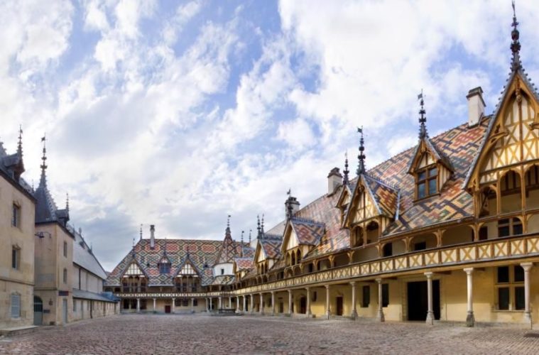 hospice de beaune old buildings with coloured tiles
