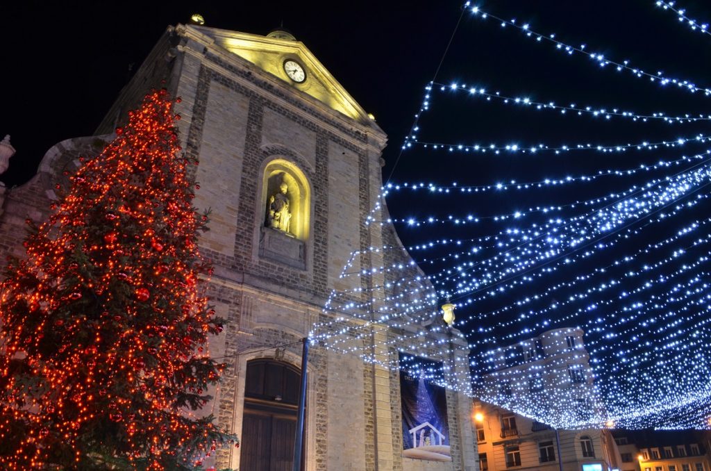 View of the church in Boulogne with illuminated Christmas tree and blue lights