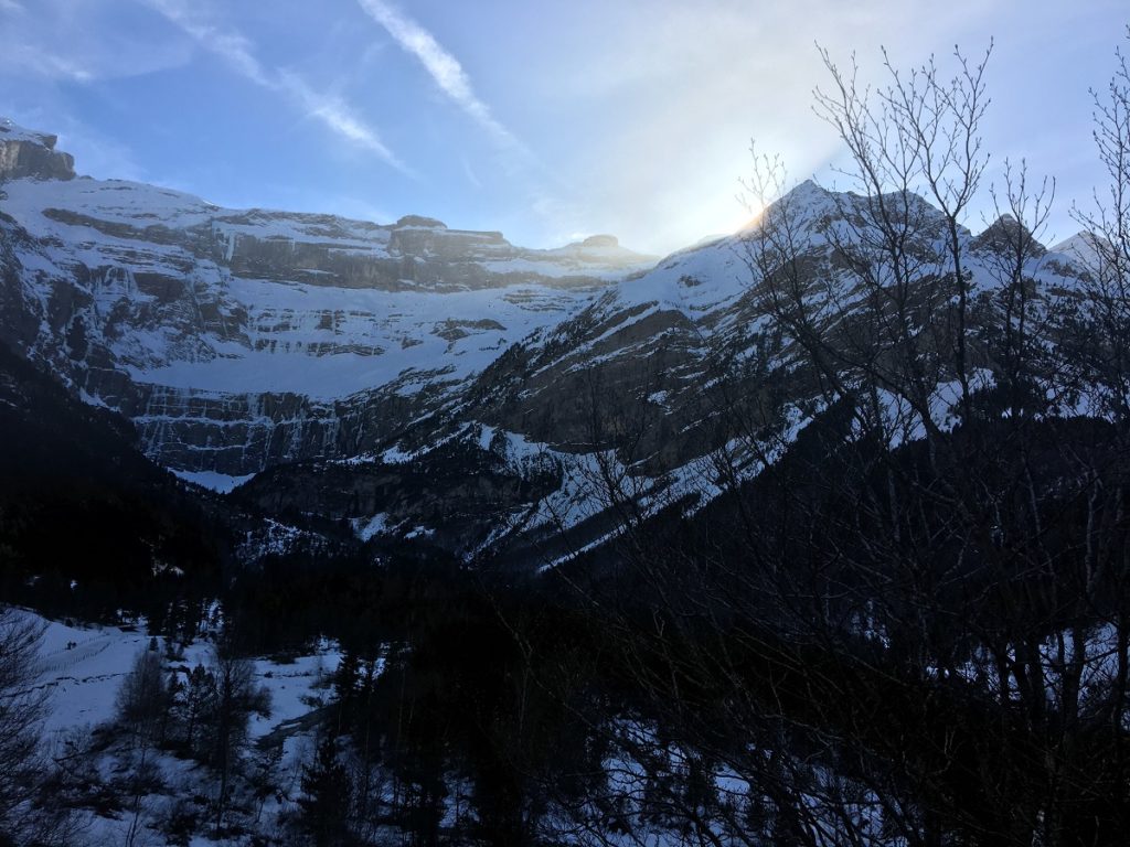 Sunset over Cirque de Gavarnie with snow covered mountains in distance