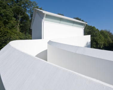 Wilfred Owen Memorial a white house with white ramp up looking like a sculpture