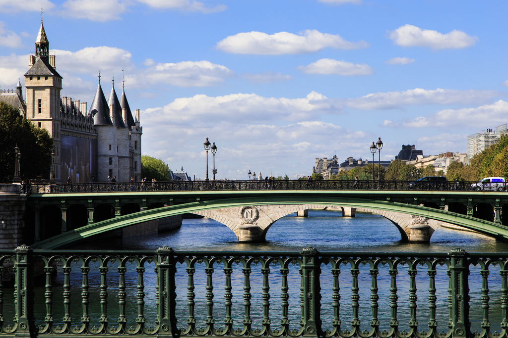 On the Pont Notre Dame in Paris looking down the river with conciergerie on left