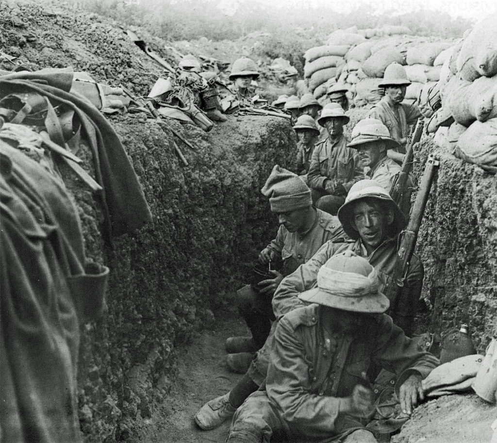 Black and white photograph of soldiers in trench