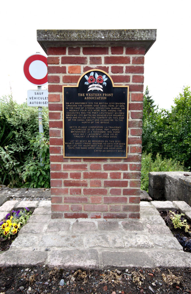 Red brick plaque on Wilfred Owen in Ors