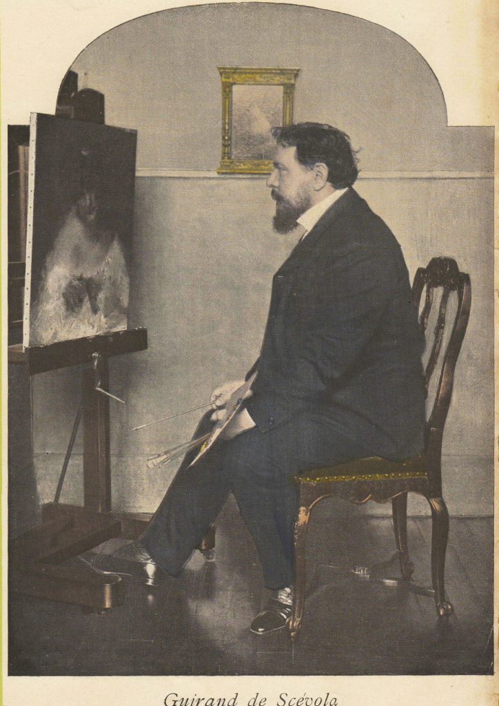 Guirand de Scévola, French camouflage inventor sitting in chair in front of a painting with painbrush in hand