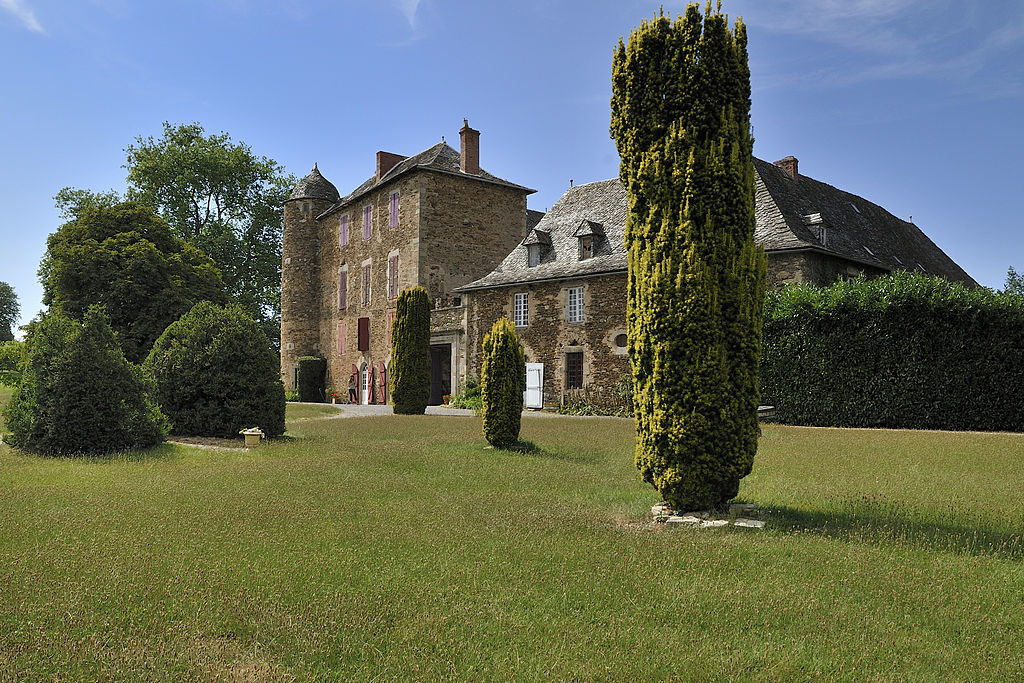 View of park and trees in front of the Chateau du Bosc in the Aveyron region