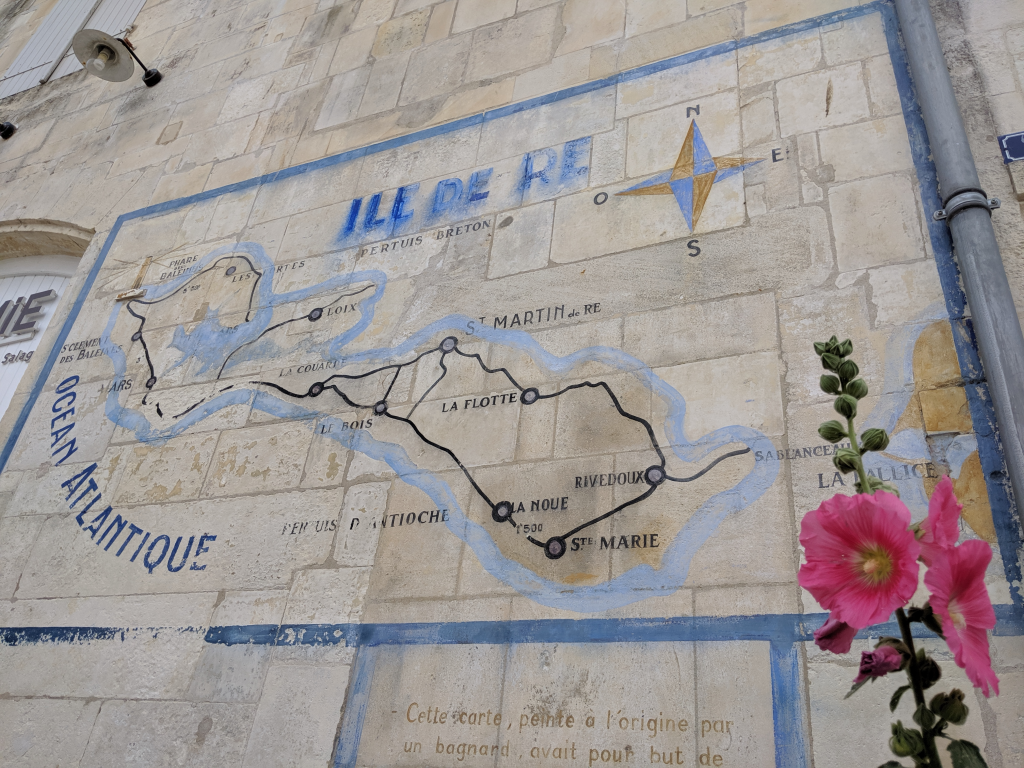 Map of Ile de Re on a wall with main cities