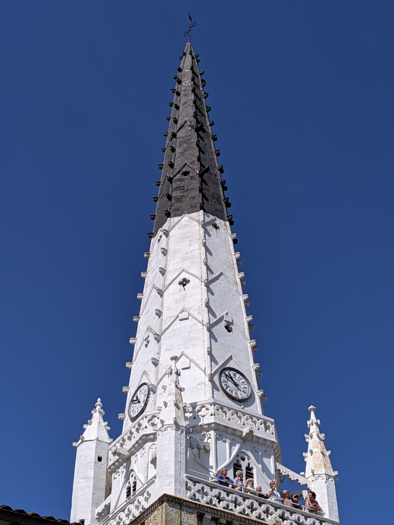 Ars-en-Re church steeple, half black and half white