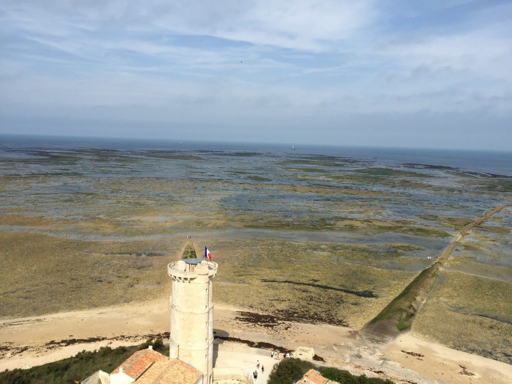 View over the tower of the Ile de Re lighthouse and the salt  marshes and Atlantic
