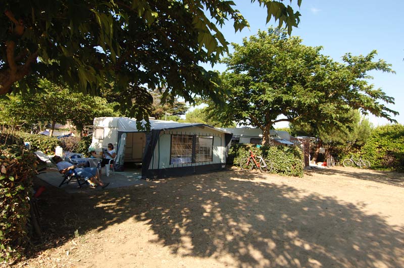 Caravan pitch at Camping Le Cormoran