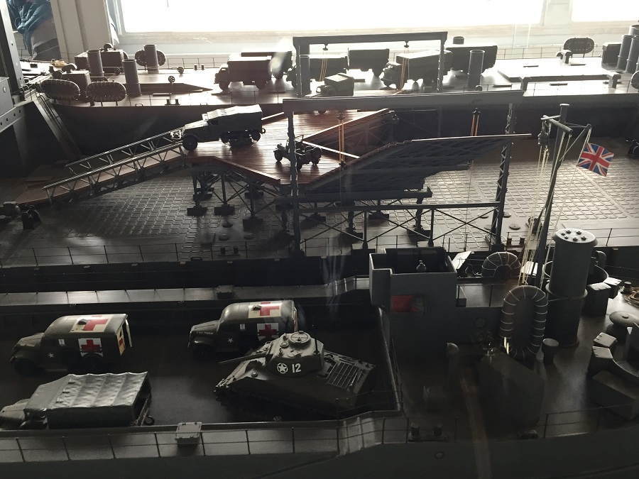 Model of Mulberry Harbour in Arromanches against window looking out to sea