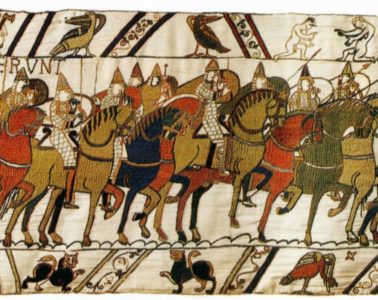 Bayeux Tapestry with many English soldiers on horseback in warm colours with beasts in bottom panel and birds and two men wrestling in top