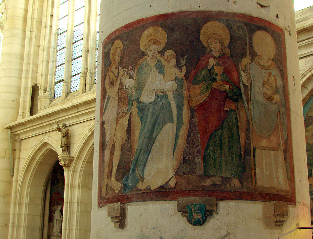 Fresco on round pillar in basilica of St Nicolas in Lorraine showing saint and figures beside him with arches and windows behind the pillar
