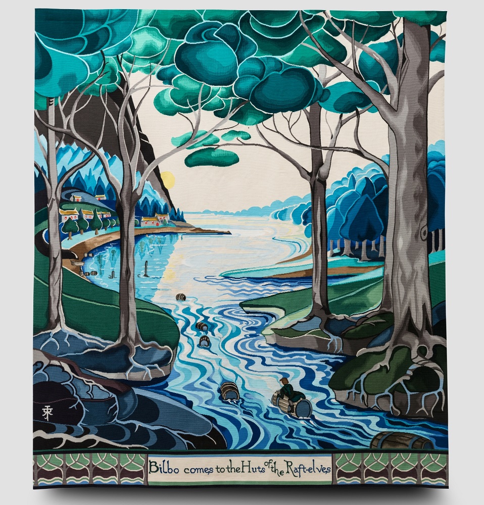 Bilbo tapestry at Aubusson part of the Tolkein series showing river at back emptying down rocks in front with stylised palm trees in foreground
