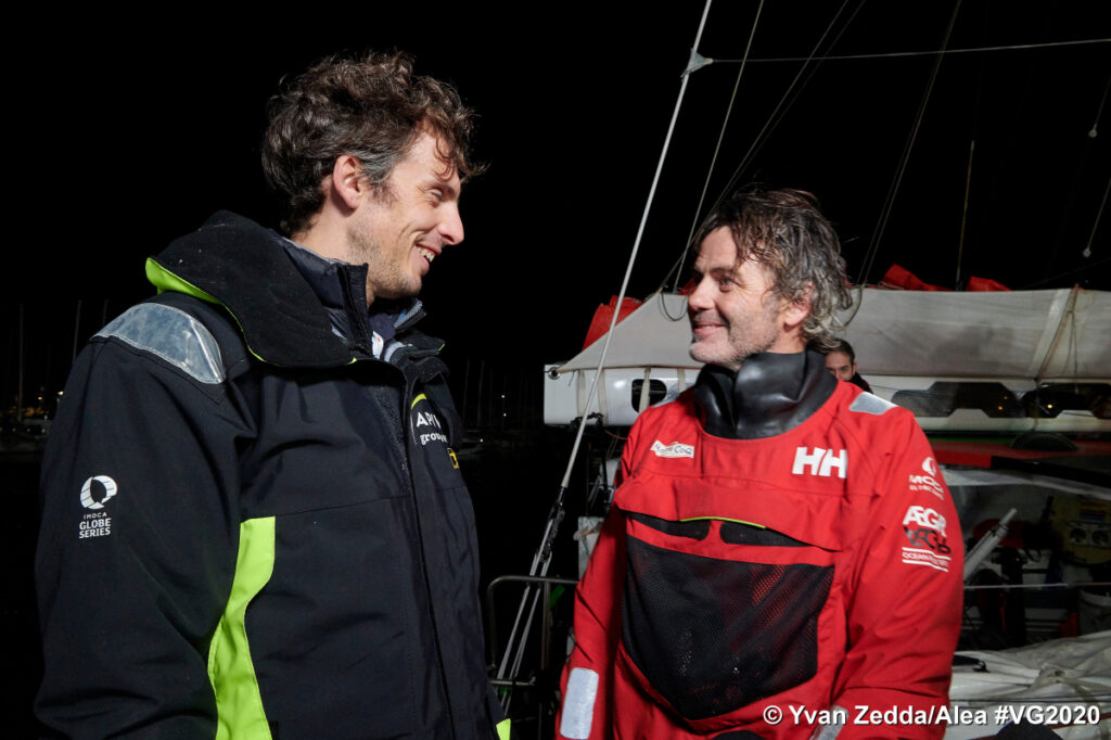Charlie Dalin and Yannick Bestaven talking just after they have both finished the Vendee Globe race at night