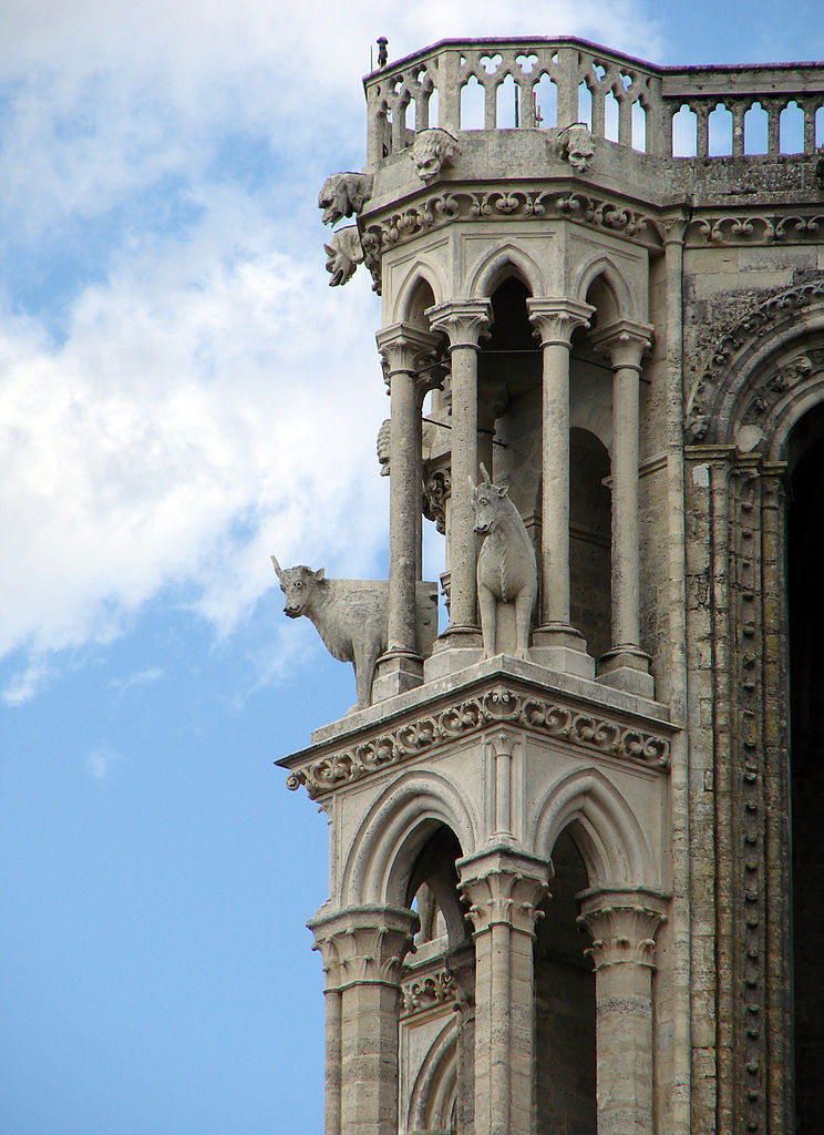 View of goat gargoyle sculpture on high part of Laon Cathdedral's exterior