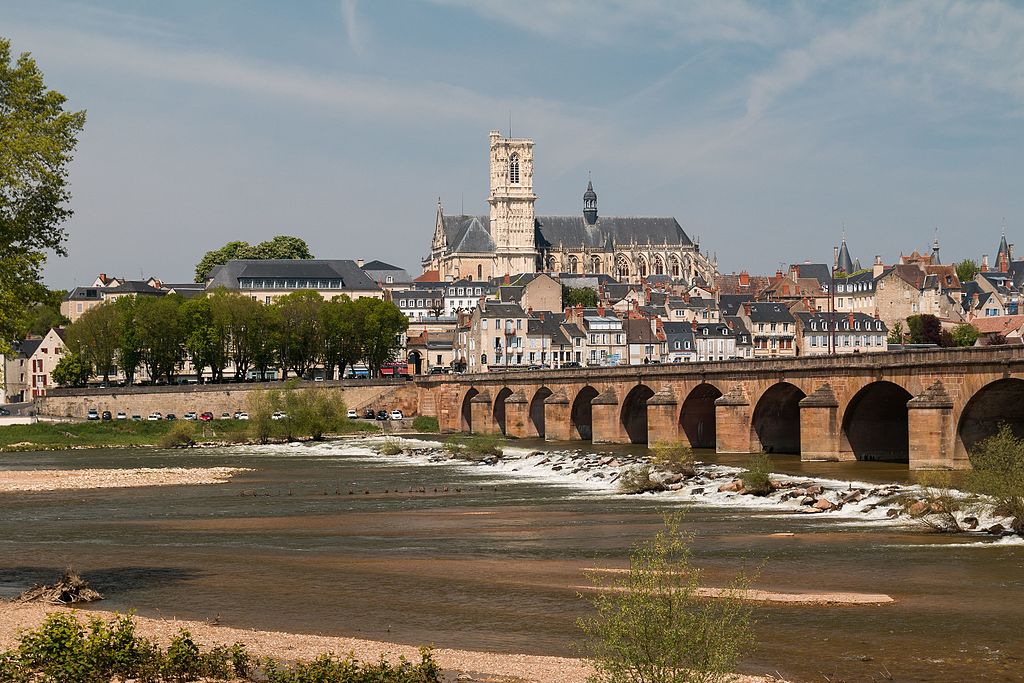 Looking at the stone bridge very long on the Loire river leading into Nevers