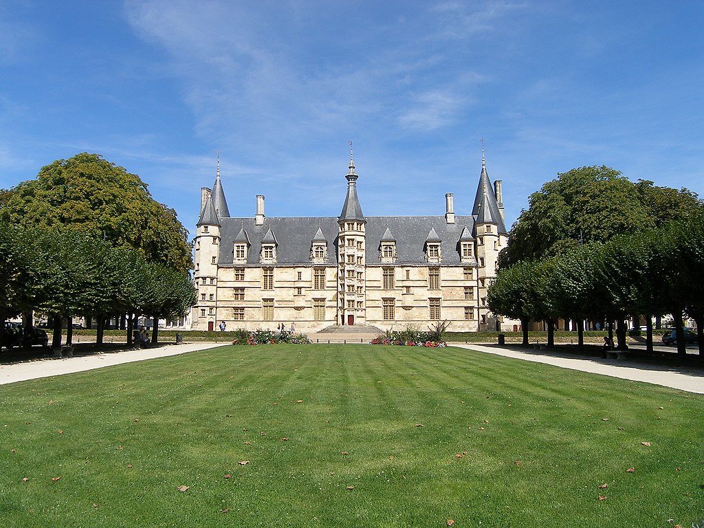 Far view of the Dukes Palce in Nevers, a building looing like a chateau with towers and onion domes, 3 storeys of stone building and dark slate roof