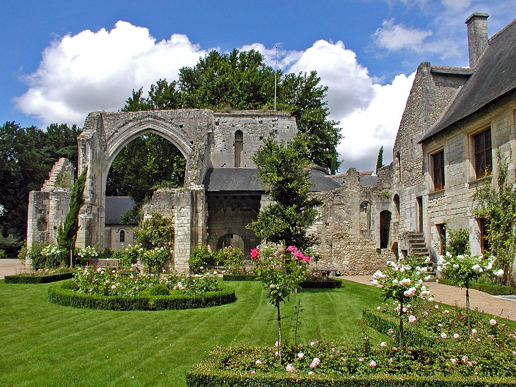 Priory of Saint Cosme in Loire Valley where Pierre Ronsard was prior. Ruins of old abbey ahead, house on right and lovely gardens with rose trees