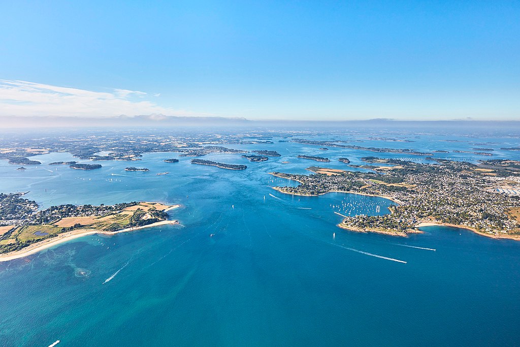 Aerial view of Golfe de Morbihan Brittany islands showing many little islands in deep blue sea