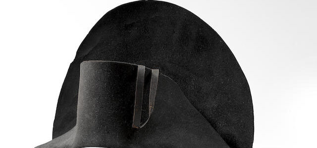 Napoleon's hat at Bonhams auction site. Plain black beaver hat on white background
