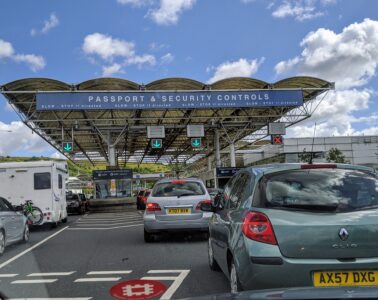 Checking in with British cars in front of check in