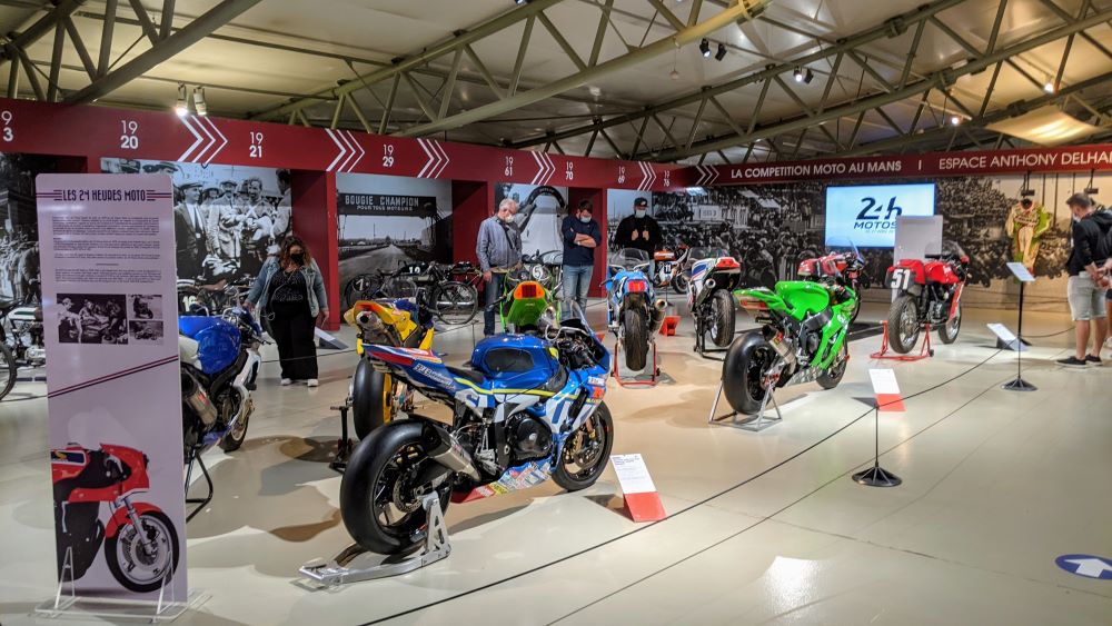 Selection of motor bikes lined up in Le Mans 24 Hour museum