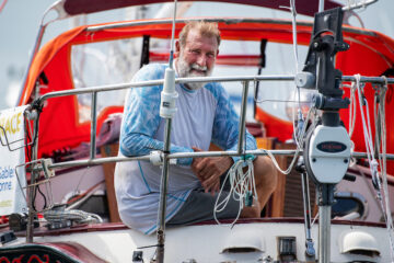 Guy de Boer on his boat looking out from the back on the GGR 2022