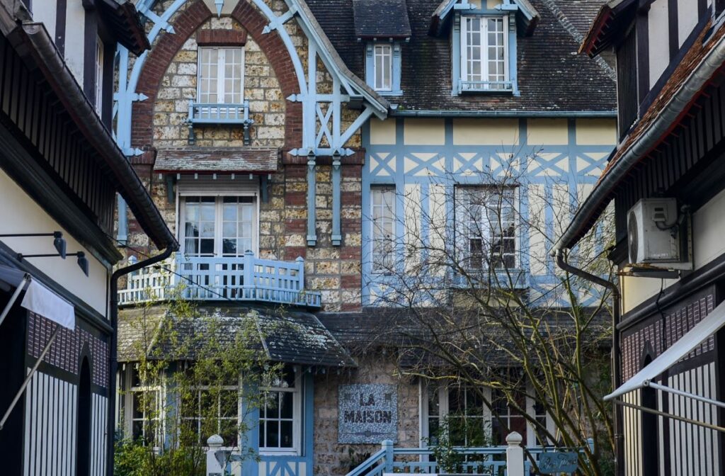 Villa in Deauville with blue half timgering, decorative brickwork in Art Decobuilding