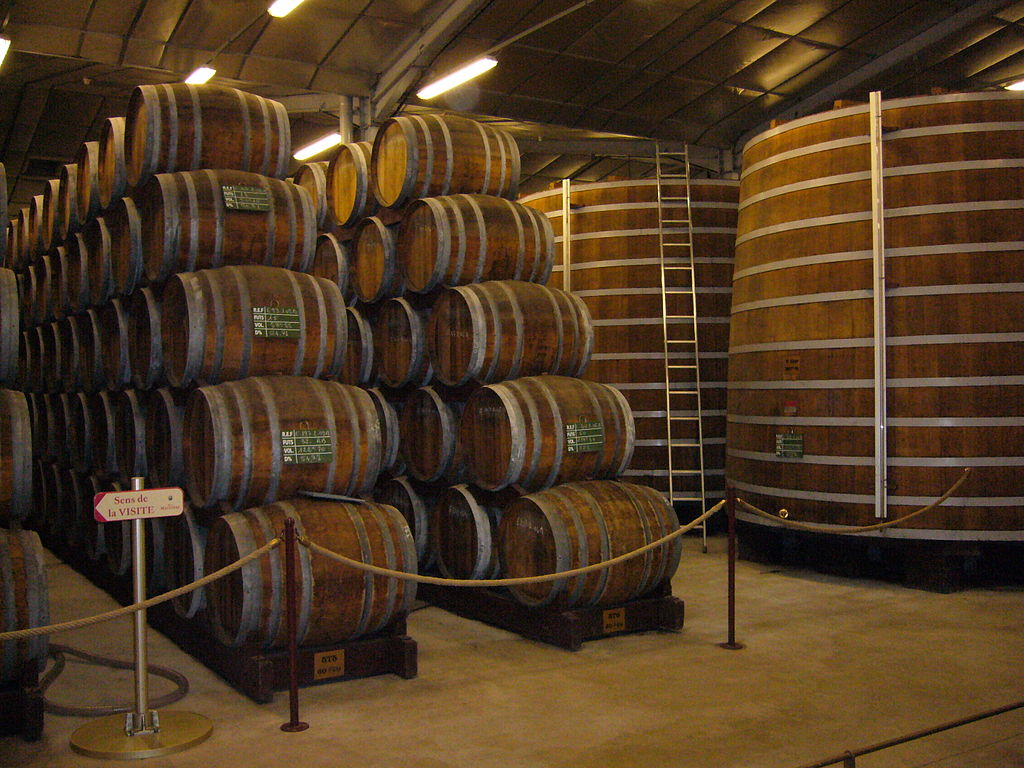 Huge stacked barrels of Calvados in their distillery in Deauville