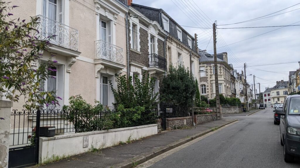 La havane old area in Saint-Nazaire. Street with different coloured 19th century villas running along one side