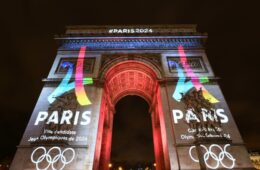Arc de Triomphe lit up with Paris Olympics colours 2024