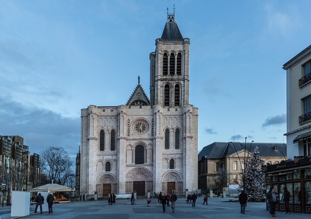 Exterior Saint Denis basilica - big stone building with two tall towers