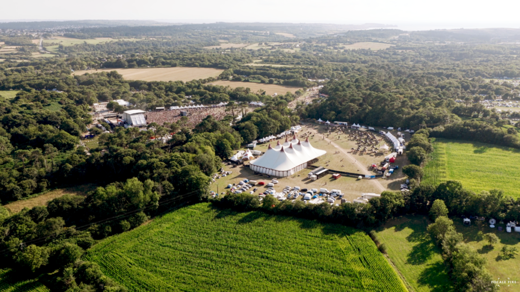 Festival Bout du Monde from drone showing grounds, tents, people etc.
