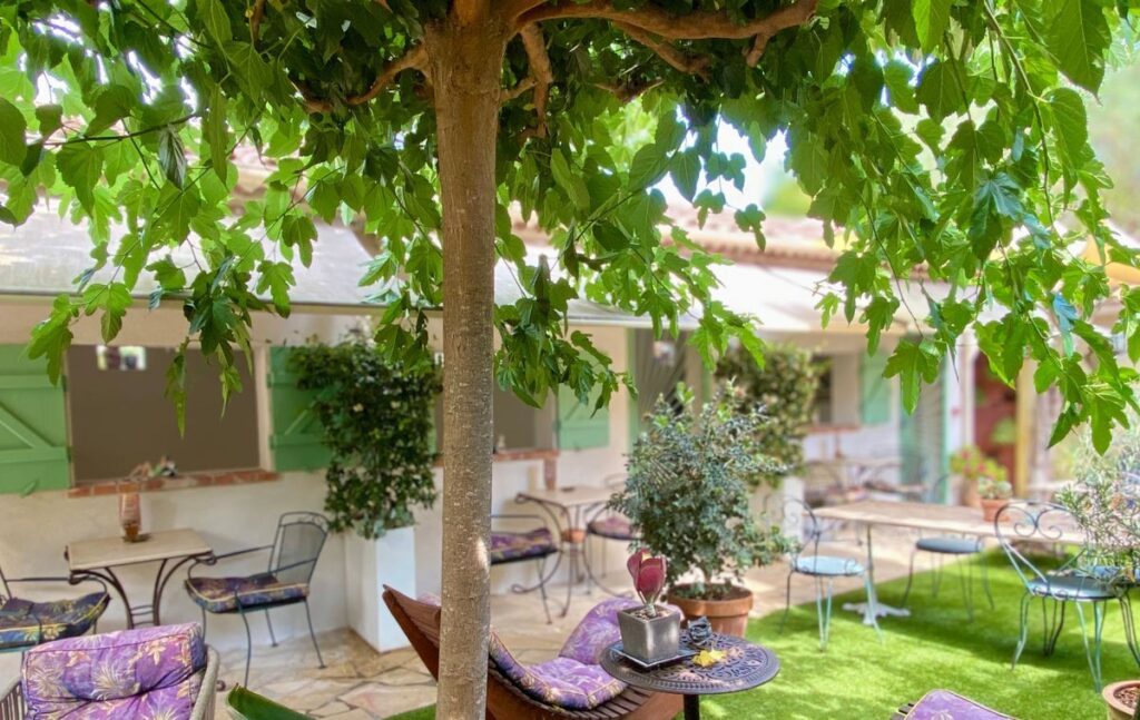 La Jabotte hotel Antibes outdoors with tabales and chairs outside rooms