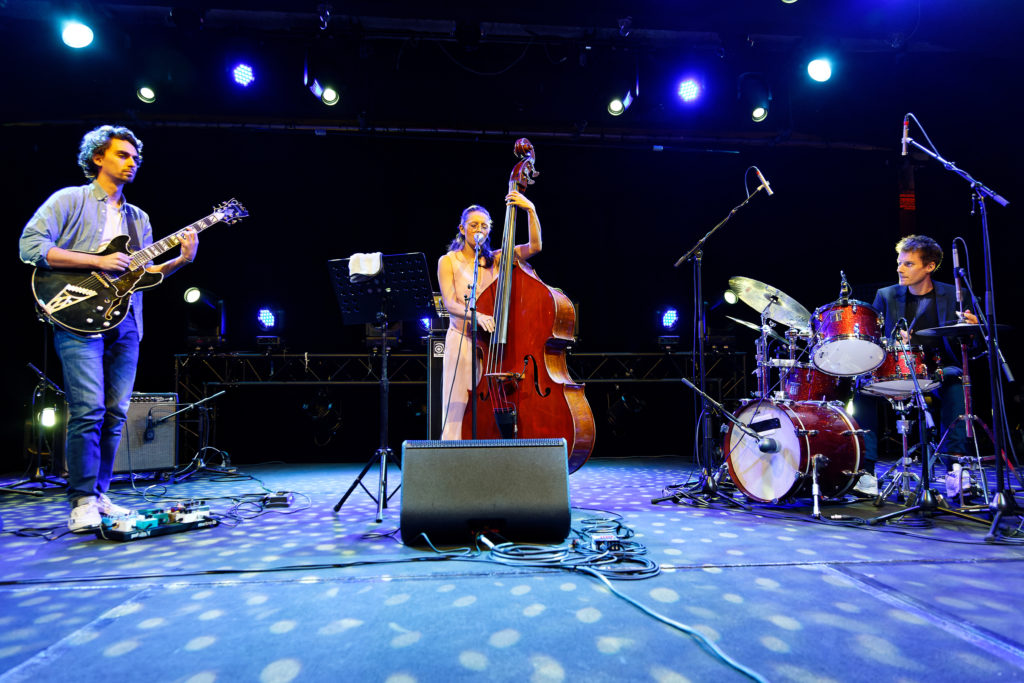 La Rochelle Jazz Festival with bass, drums and guitariston stage