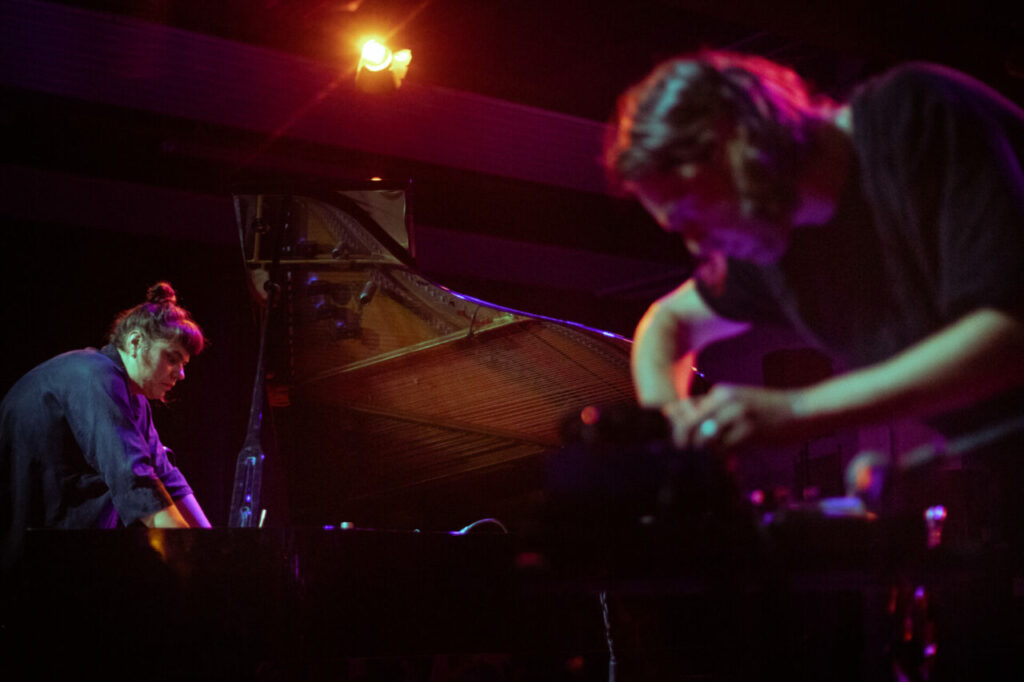 Meteo music festival 2025 with two men on stage one with guitar to front and one on keyboard