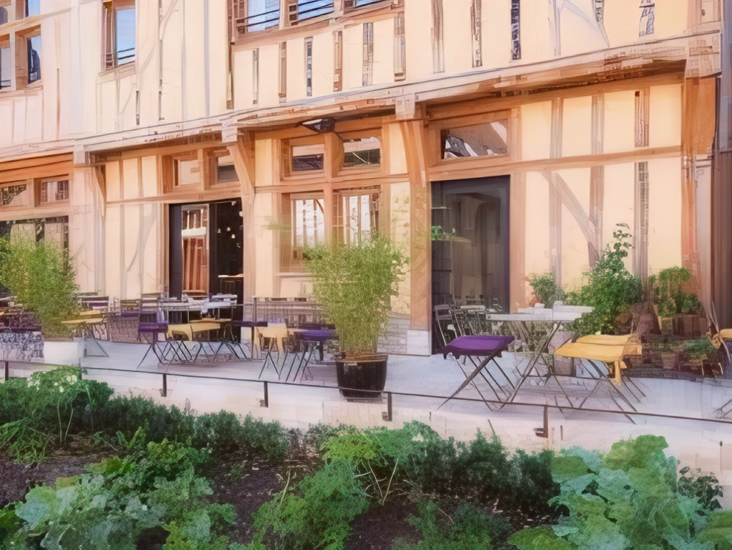 Chez Félix in Troyes outside an old half timbered house with tables and chairs