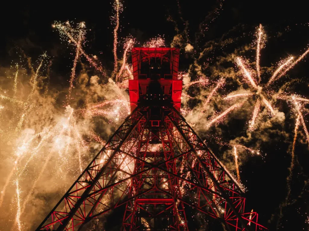 Sainte barbe festival in lens with huge steel structure lit up with fireworks