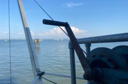 Image of end of ferry looking over sea towards Portsmouth